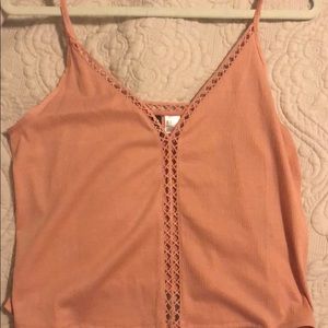 A pink tank top never worn or used